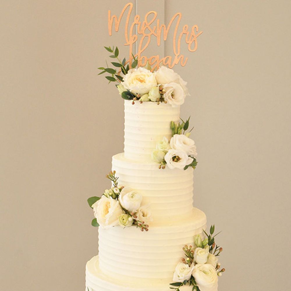 Butter iced wedding cakes fresh flowers and fruit essex cake maker
