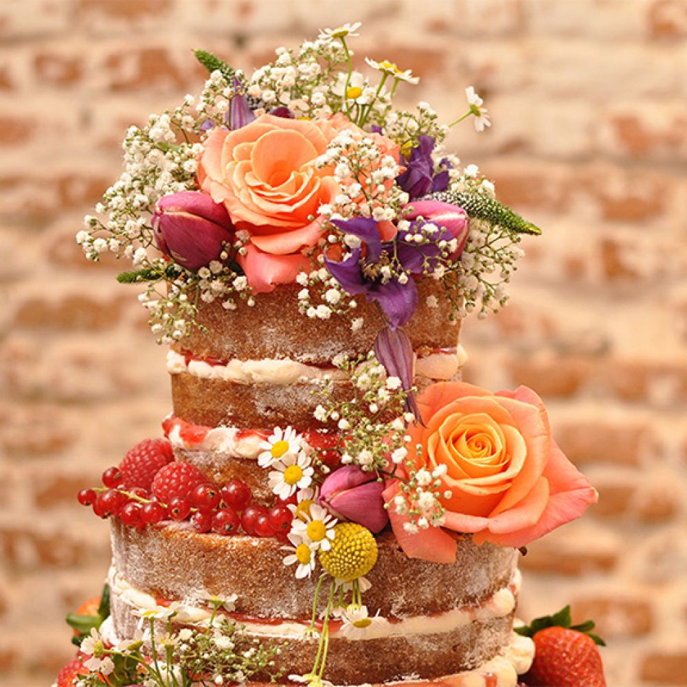Naked Wedding Cakes without icing with fresh flowers and fruit essex cake maker finesse cakes
